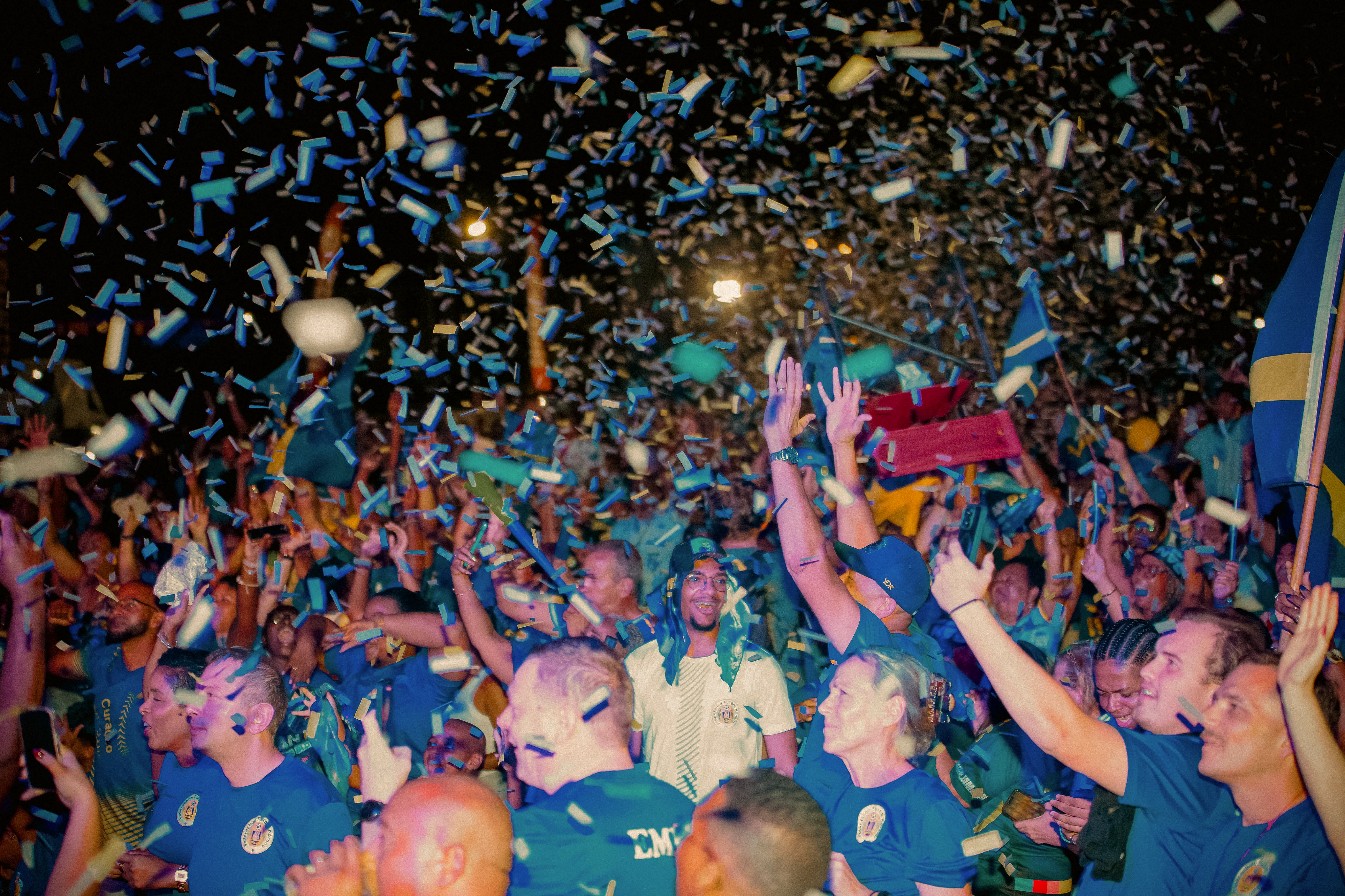 Fans of Curaçao react as they watch the 2026 FIFA World Cup qualifier football match between Jamaica and Curacao in Willemstad in Curaçao. The tiny Caribbean nation became the smallest country ever to qualify for the World Cup on Nov. 18